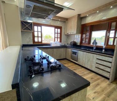 Passo de Torres House | Stay at Casa as Margens do Manpituba - Family & Pet Friendly