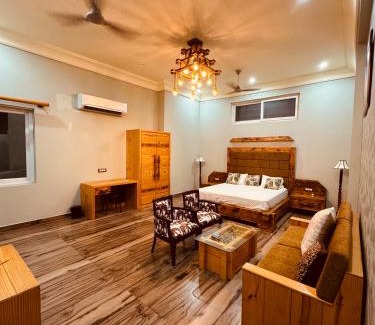 Varanasi House | ```html
Inviting Dharm Regency: Pet-Friendly with a Relaxing Hot Tub
```