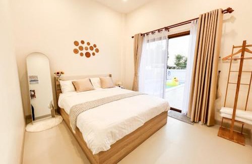 Sattahip Villa | Experience The Teak Poolvilla: Family-Friendly Retreat