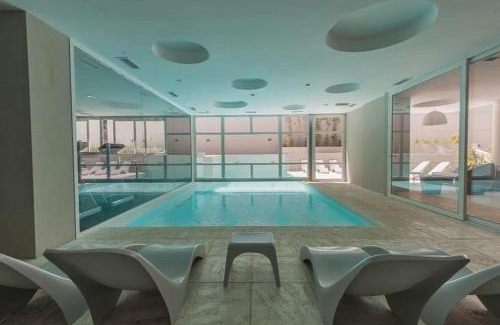 Carilo Apartment | Relaxing Vizion Suites Carilo - Pool & Hot Tub Oasis