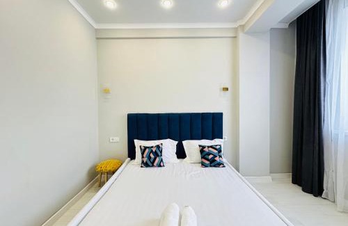 Almaty Apartment | Family-Friendly Retreat at Тургут Озала 261 with Pool