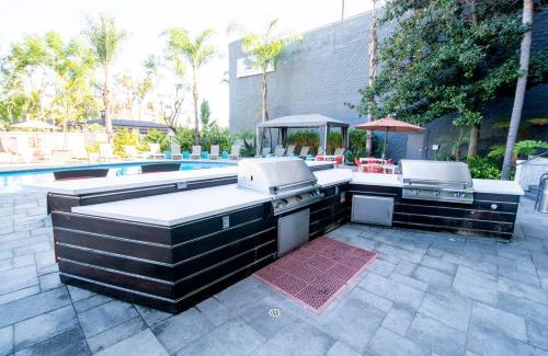 Civic Core Apartment | Downtown Oasis with Pool and Jacuzzi - 4-Star Retreat
