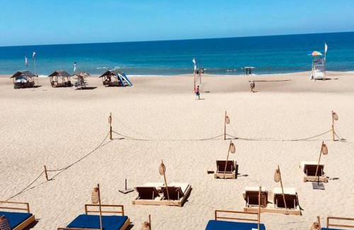Bacnotan Apartment | Cozy Wave Beach House - Pet and Child Friendly Retreat