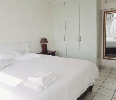 North Beach Apartment | Beachside Bliss at Oceanic 84 Durban with Pool & Family Fun