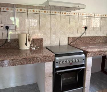 Galu House | Exceptional Stay at Zuri's Garden - Pet Friendly & Pool Access