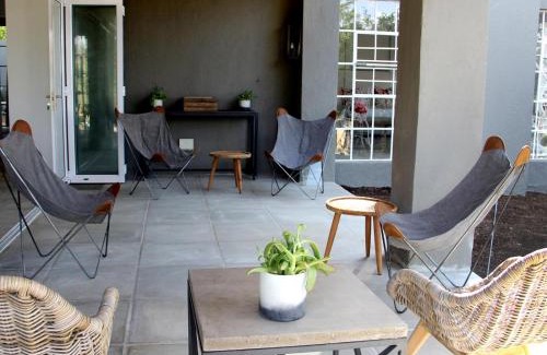 Lanseria House | Bright and Inviting: White Light Rooms with Family Amenities