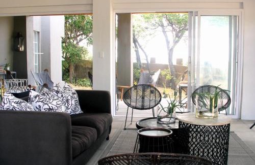 Lanseria House | Bright and Inviting: White Light Rooms with Family Amenities