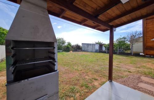 Arroio do Sal House | Pet-Friendly Stay at Cabana Refúgio Casa do Sol Retreat