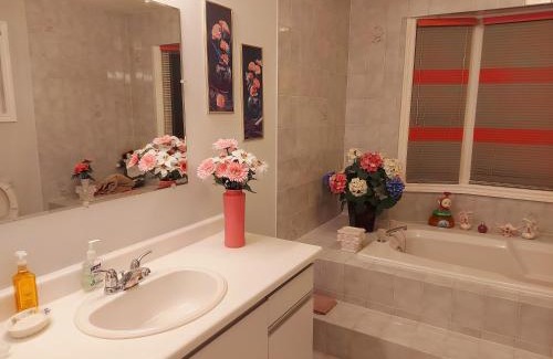 Erin Mills House | Inviting Bedroom with Private Bathroom and Kitchen Access