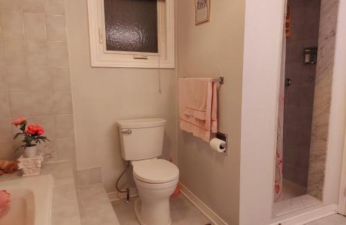 Erin Mills House | Inviting Bedroom with Private Bathroom and Kitchen Access