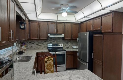 Erin Mills House | Inviting Bedroom with Private Bathroom and Kitchen Access
