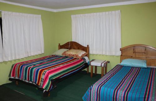 Isla Amantani Bed & Breakfast | Budget-Friendly Sunset Lodge Amantani for Family Getaways