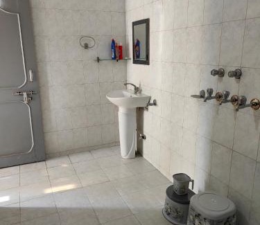 Faizabad Apartment | Cozy Family Homestay in Shantiniketan - Pet Friendly Stay