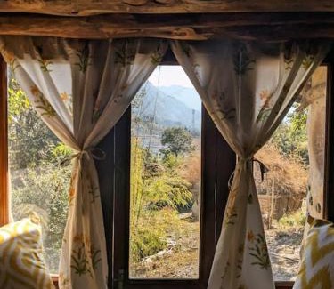 Naina Range Bed & Breakfast | Enchanting Earthen Retreat with SUV Access and Family Amenities