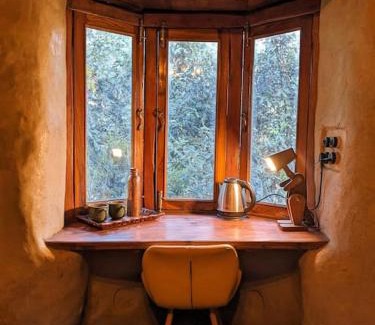 Naina Range Bed & Breakfast | Enchanting Earthen Retreat with SUV Access and Family Amenities