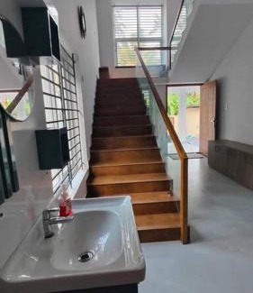 Irinjalakuda Apartment | Waterfront Homestay in Thrissur: Family-Friendly Retreat