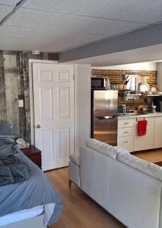 Ottawa Division House | Serene Nature Retreat with Inviting Hot Tub Experience