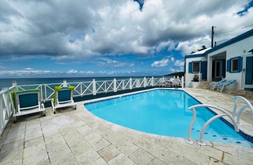 North Star Villa | North Star Villa: Oceanfront Family Retreat with Pool Access