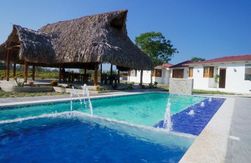 Sabanagrande House | Discover Cabaña DonJerónimo: Family-Friendly Oasis with Pool