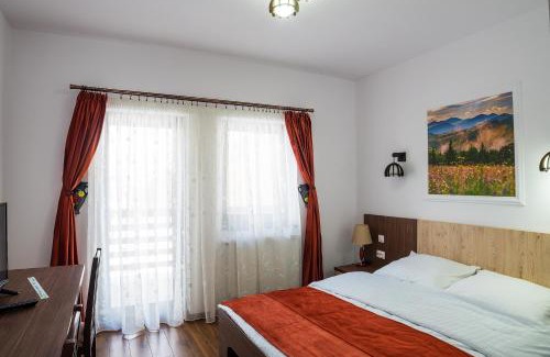 Gura Humorului House | Relax at Drag de Bucovina with Hot Tub & Family Amenities