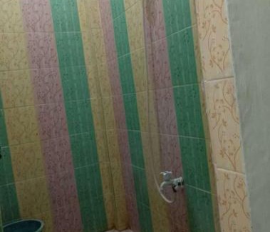 Pekanbaru House | Budget-Friendly Stay at Fauzan Kost - Perfect for Families