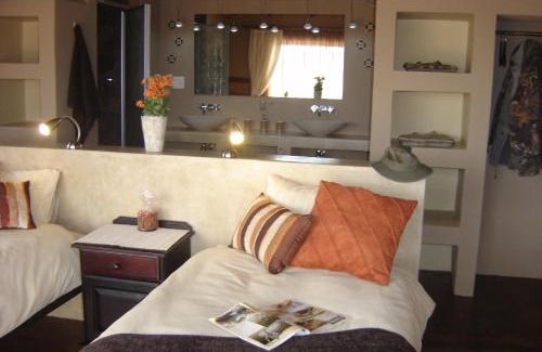 Windhoek Rural House | Relax at Arub Chalet Farm Stay: Pool and Accessible Amenities