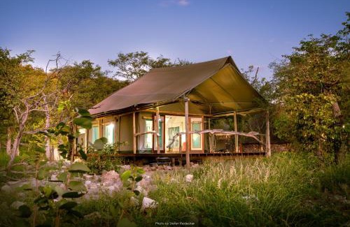 Okaukuejo Cabin | Ongava Tented Camp: Experience Nature with Ocean Views