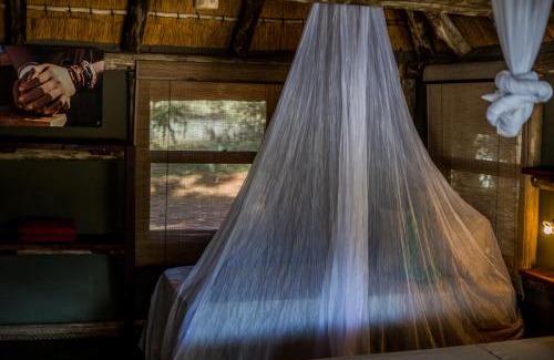 Epupa Cabin | Explore Epupa Falls Lodge with Pool & Pet-Friendly Amenities