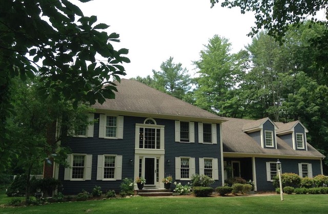 Large New England Home with wonderful amenities inside and out.