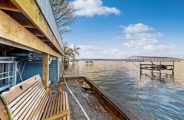 Lakefront home with private dock, lake views, deck, grill, streaming, & 1 kayak