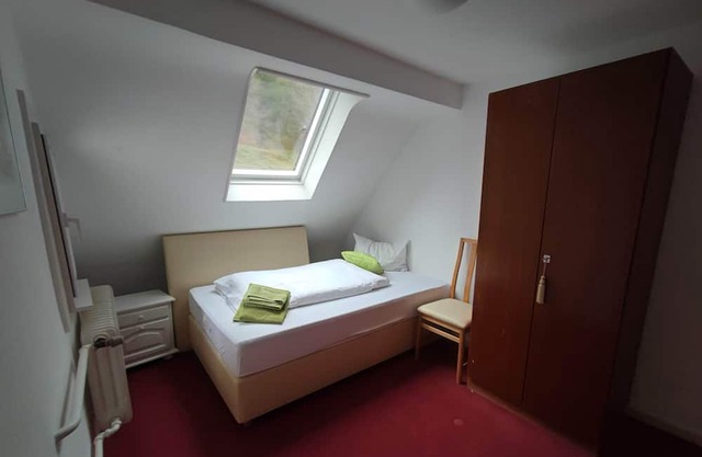 Single room with shared bathroom and kitchen