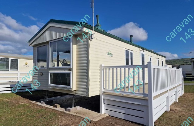 Lovely 3 bedroom caravan on family holiday park. Pet friendly.
