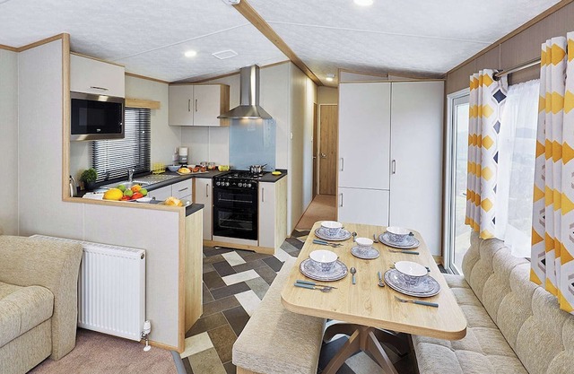A modern holiday home with one master double and two twin bedrooms.