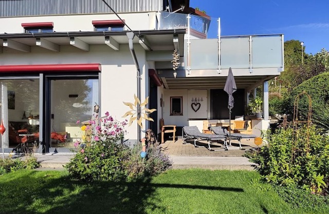 Modern bright apartment GRÜNTENSICHT for 2. persons mountain view and meadows invite you.