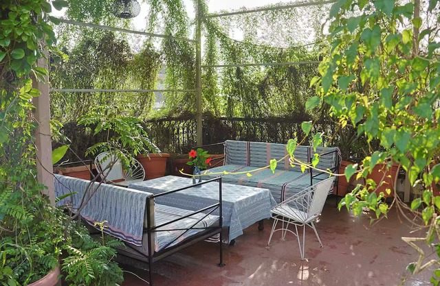 Rooftop Apartment with Garden View