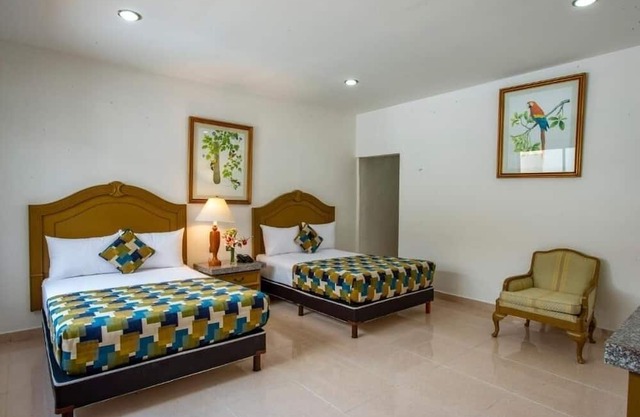 Double Room Poolside Mérida Getaway with Terrace, WiFi & Family-Friendly Comfort