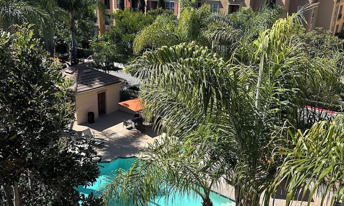 Airport Area Apartment | Relaxing Bedroom with Blackout Curtains for Peaceful Rest