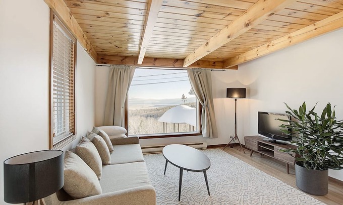 Baie-St-Paul Apartment | Charming Apt with Fireplace & Views, 10 Min to Massif