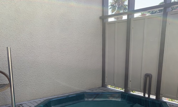 Omanu Apartment | Family holiday Apartment, close to beach. Has shared swimming pool and own spa.