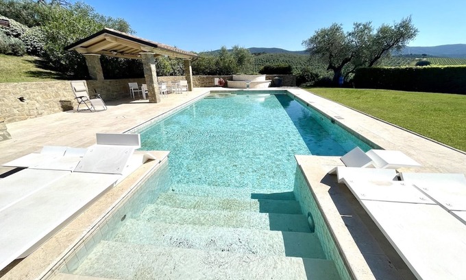 Castiglione della Pescaia Villa | Modern Villa with Pool & Tennis, Minutes from the Beach