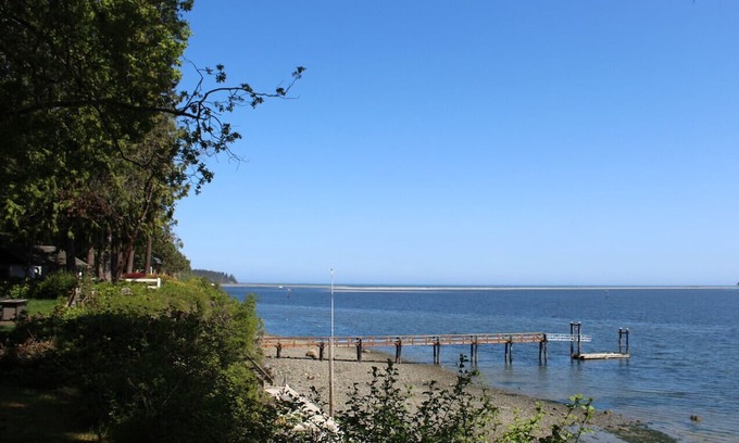 Sequim House | Idyllic Retreat Overlooking Sequim Bay Amidst Evergreens