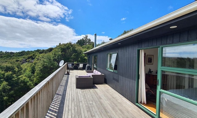 Kawau Island House | Cozy Island Retreat with Ocean View and Poolside Relaxation