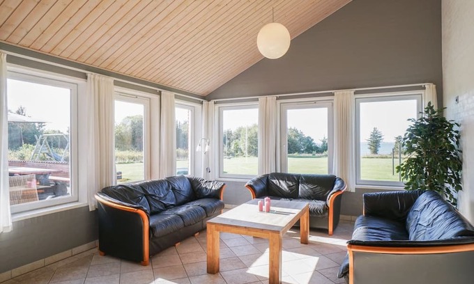 Spøttrup House | Melvin: Oceanfront Retreat with Private Pool & Spa Access