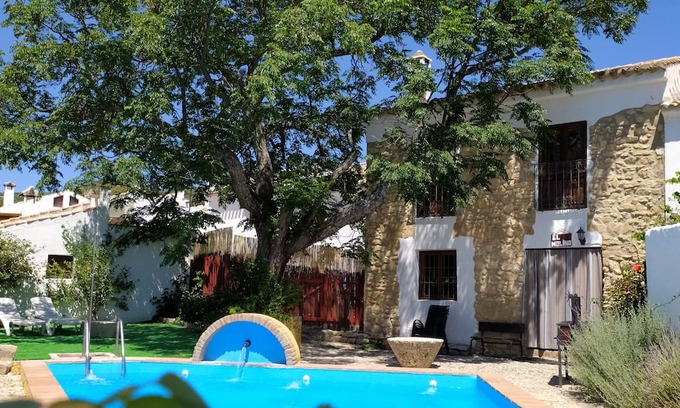 Algarinejo House | Restored Mill Retreat with Private Pool in Grenada