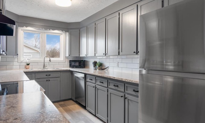 Dieppe House | Modern Retreat with King Bed, Steps from Dining & Starbucks