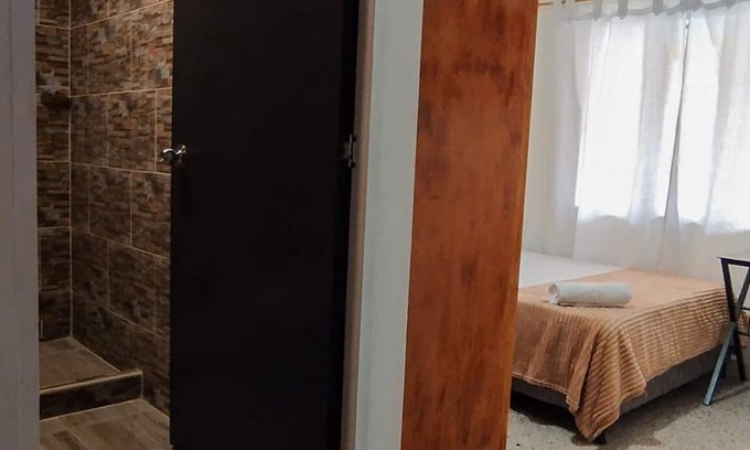 Itagui House | Quiet Retreat near Envigado Station with Top Amenities