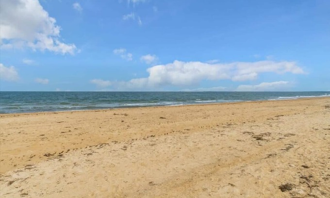Cottage Line Apartment | Beachfront 2BR Sea Breeze Suite with Pool and Balcony