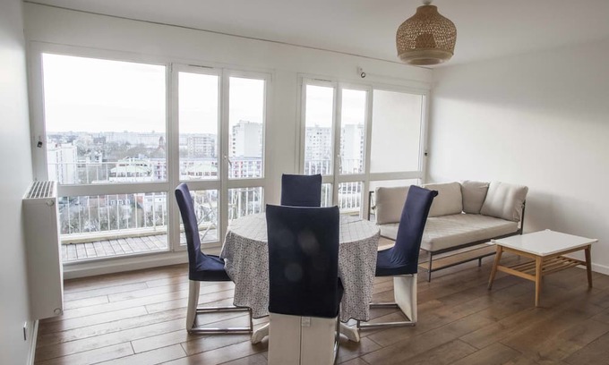 L'Ile-Saint-Denis Apartment | Inviting Apartment with Eiffel Tower Views and Family Amenities