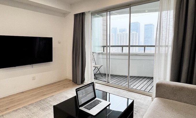 Huaihai Road Commercial Area Apartment | Peaceful Urban Retreat in a Minimalist City Apartment