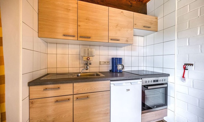 Untervalme House | Bright Apartment with Private Terrace and Family Amenities
